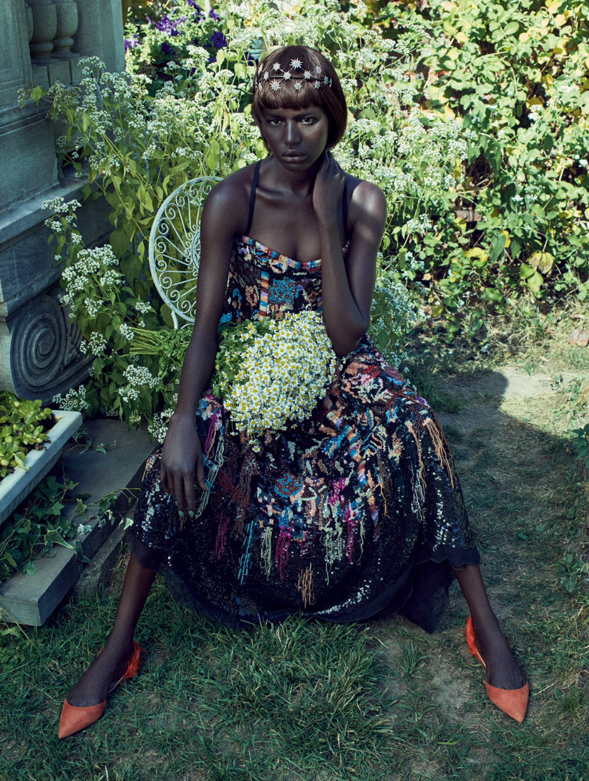 Ajak Deng Poses In A Blooming Paradise for ELLE UK | BN Style