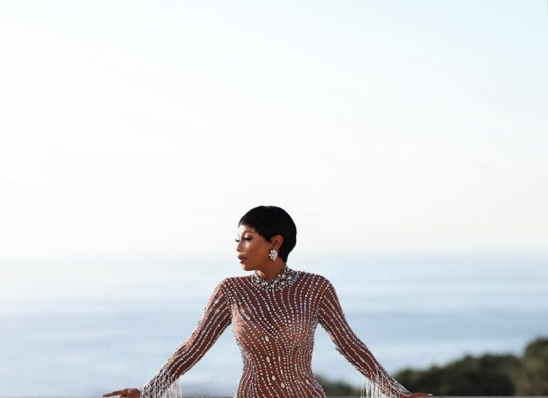 Cynthia Erivo Wears Vibrant Louis Vuitton Cityscape-Print Outfit